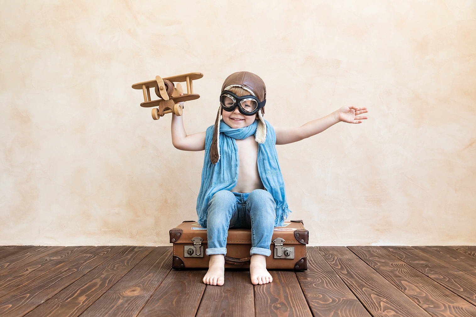 Happy,Child,Playing,With,Vintage,Wooden,Airplane.,Kid,Having,Fun